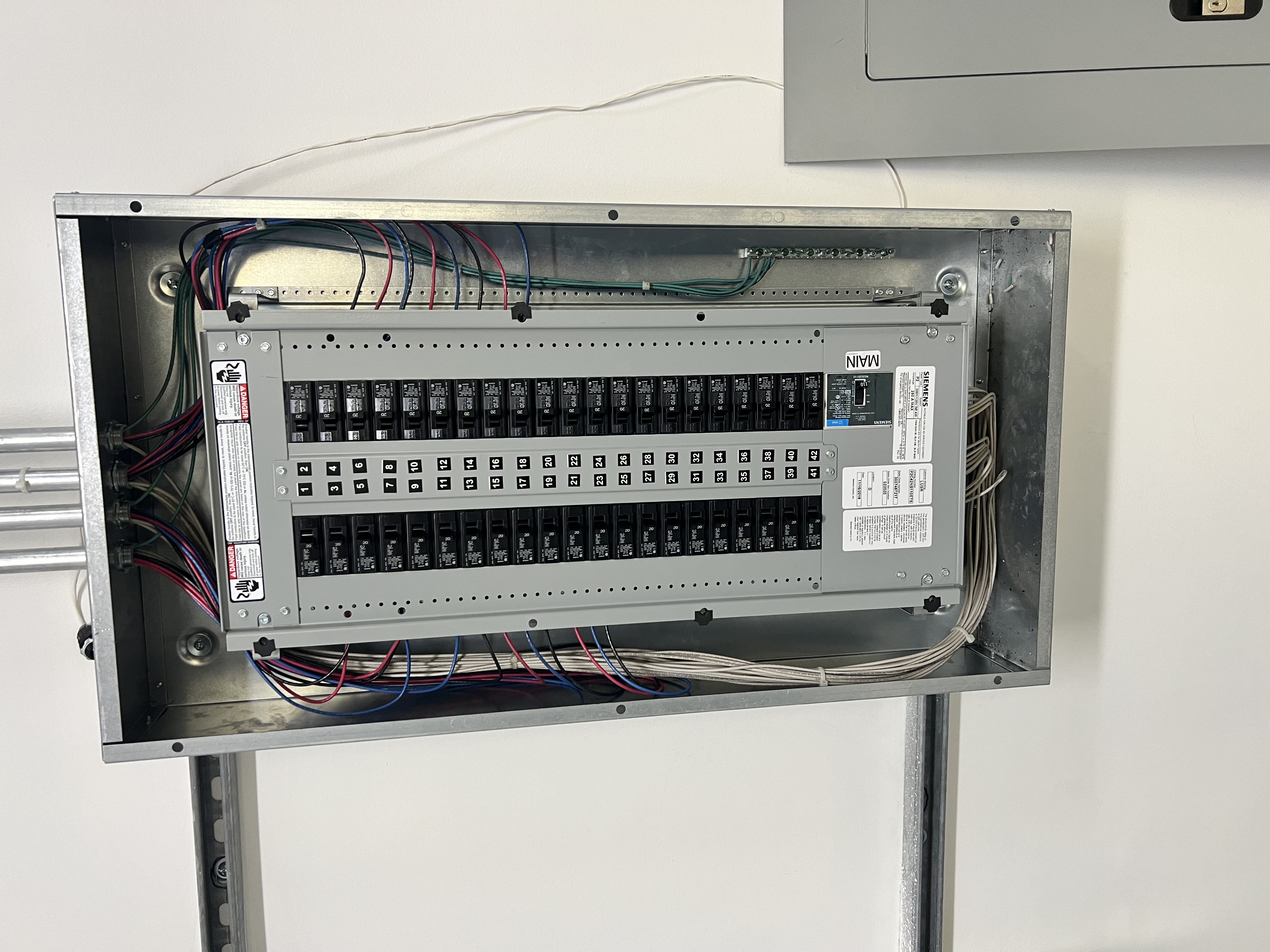 Siemens electrical panel upgrade and wiring by Eli-energy Inc